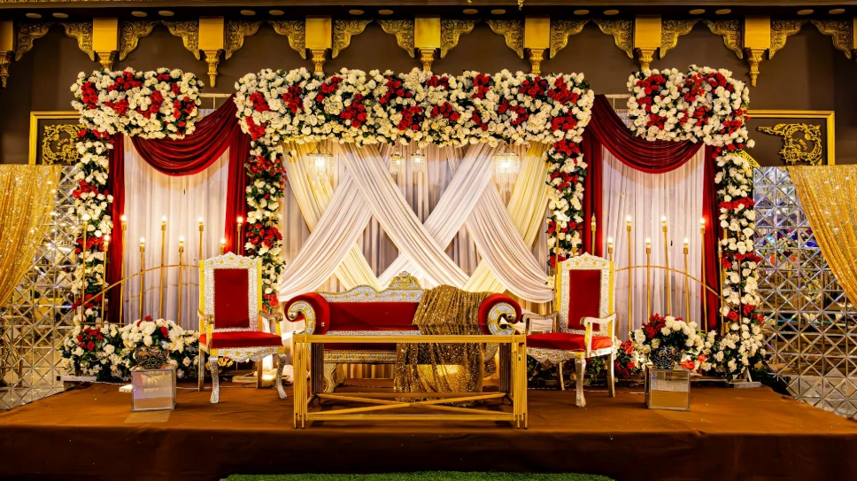 A beautiful stage is decorated for an event.
